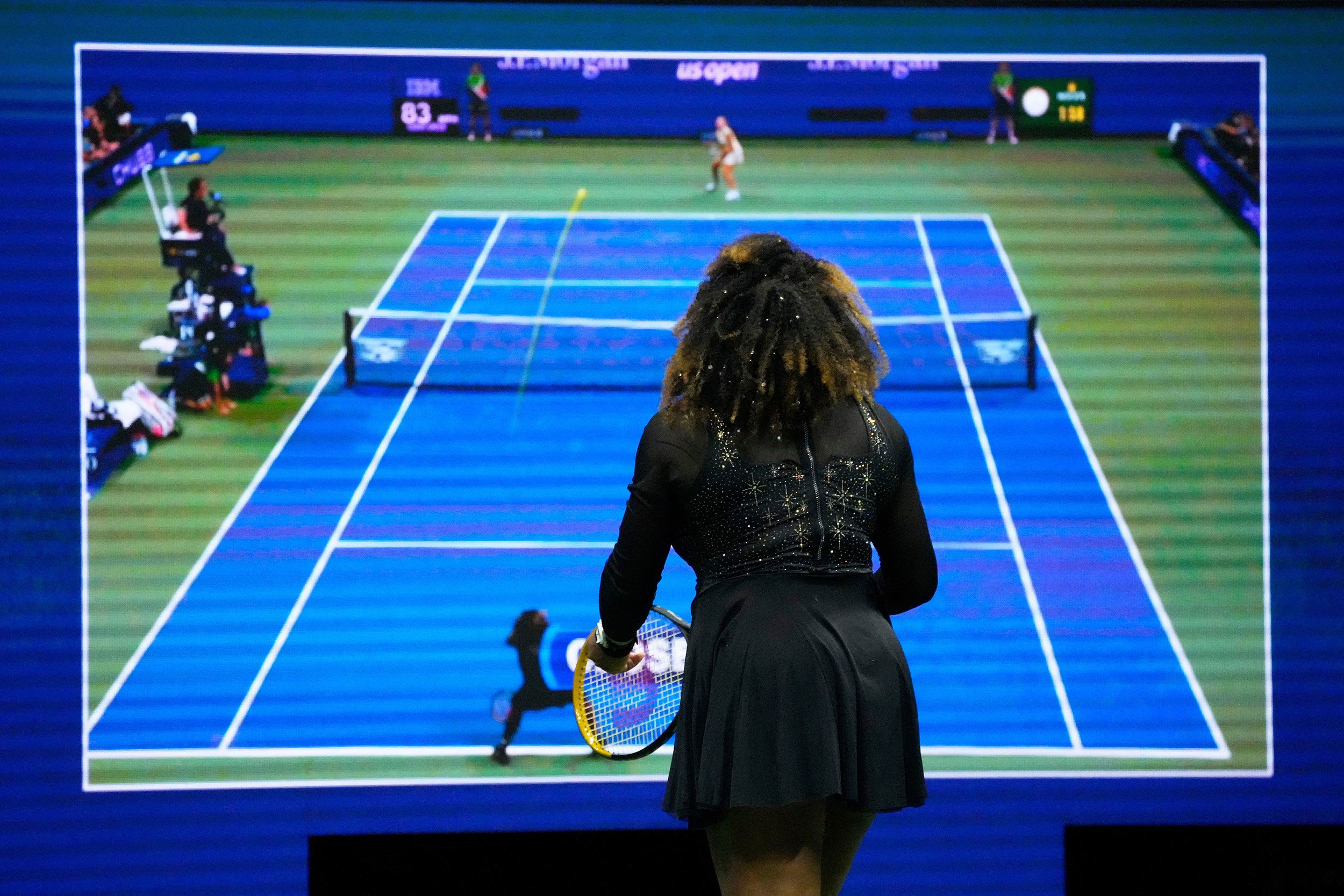 Williams watches a replay during Wednesday's match.