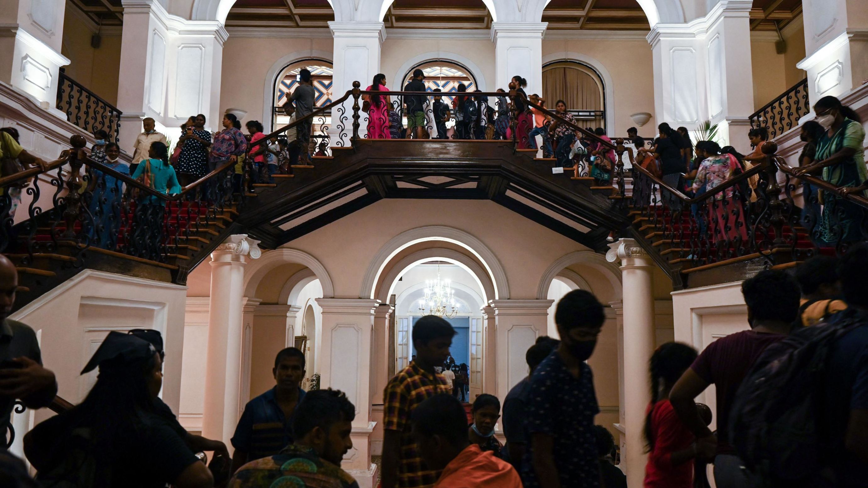 People visit former president Gotabaya Rajapaksa's official residence in Colombo on July 12, 2022, after it was overrun by anti-government protestors on July 9. 