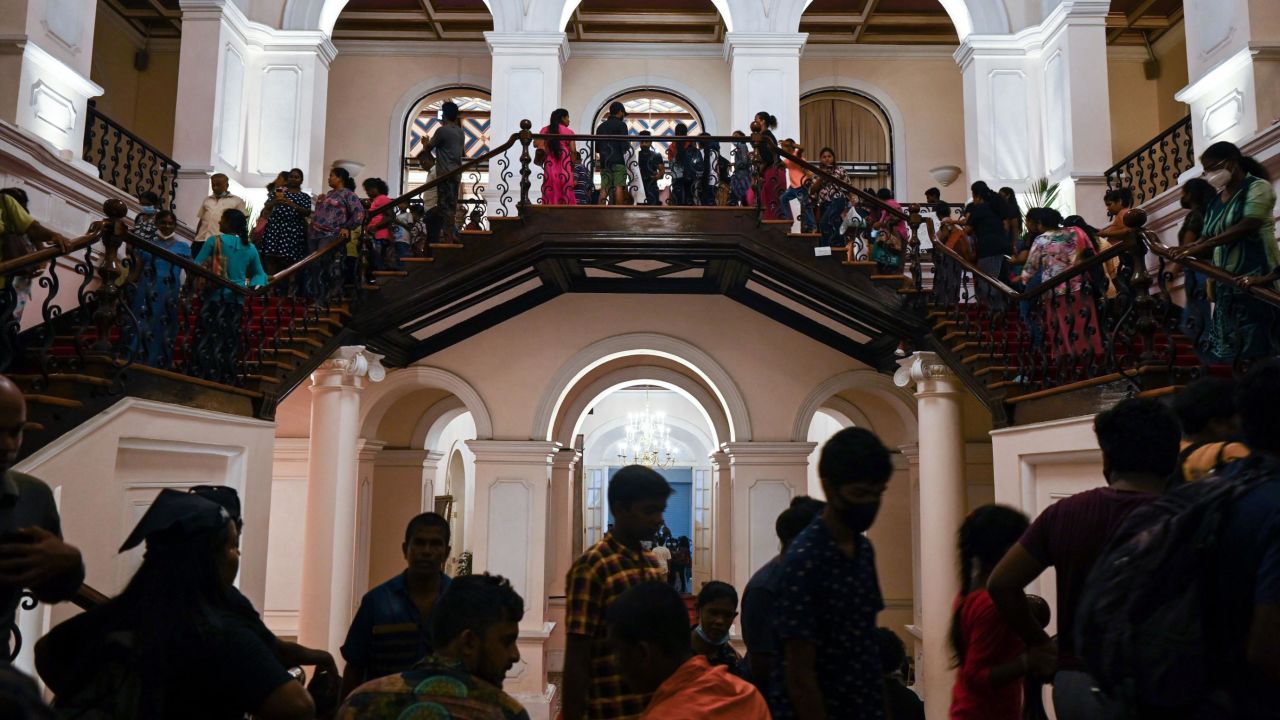 People visit former president Gotabaya Rajapaksa's official residence in Colombo on July 12, 2022, after it was overrun by anti-government protestors on July 9.