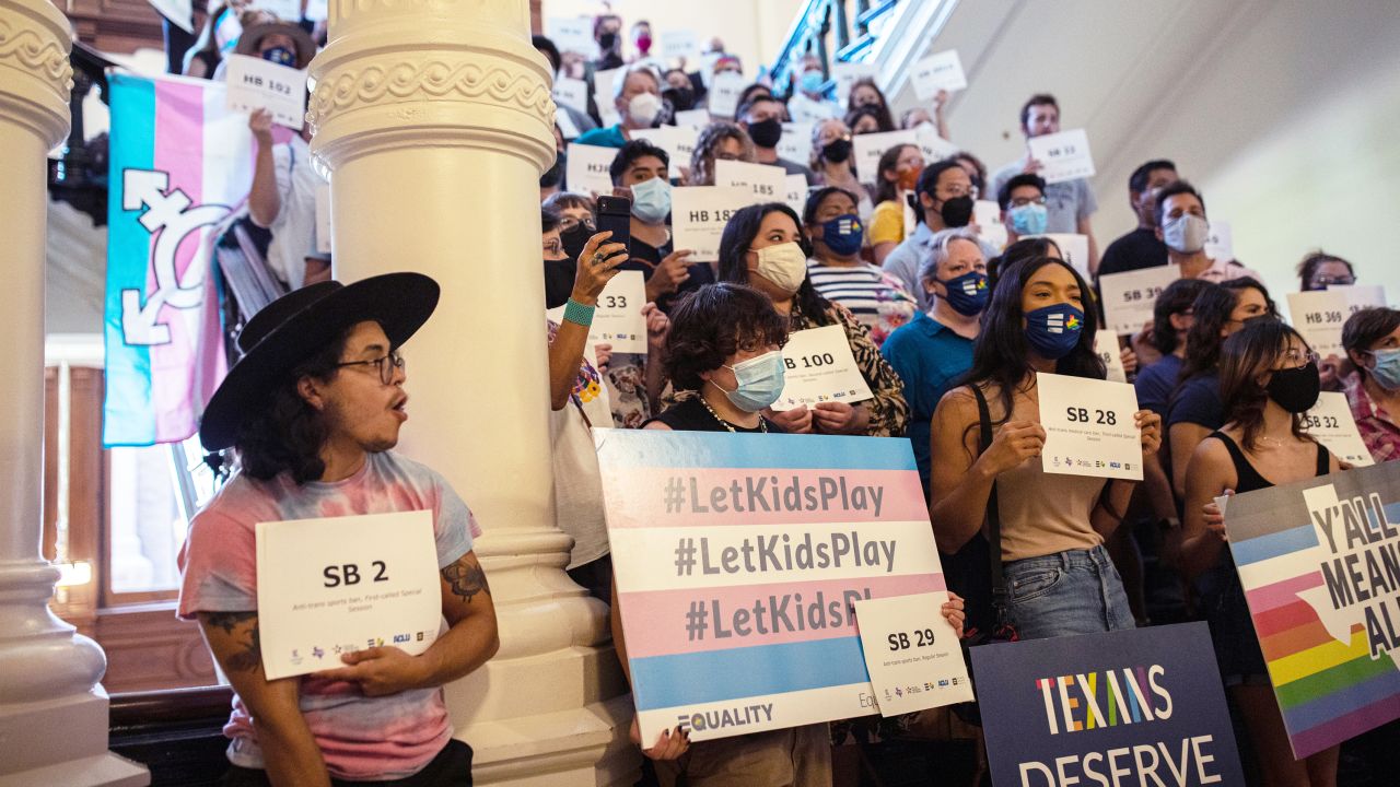 LGBTQ rights supporters gathered at the Texas State Capitol to protest state Republican-led efforts to pass legislation that would restrict the participation of transgender student athletes on the first day of the 87th Legislature's third special session on September 20, 2021, in Austin, Texas. 