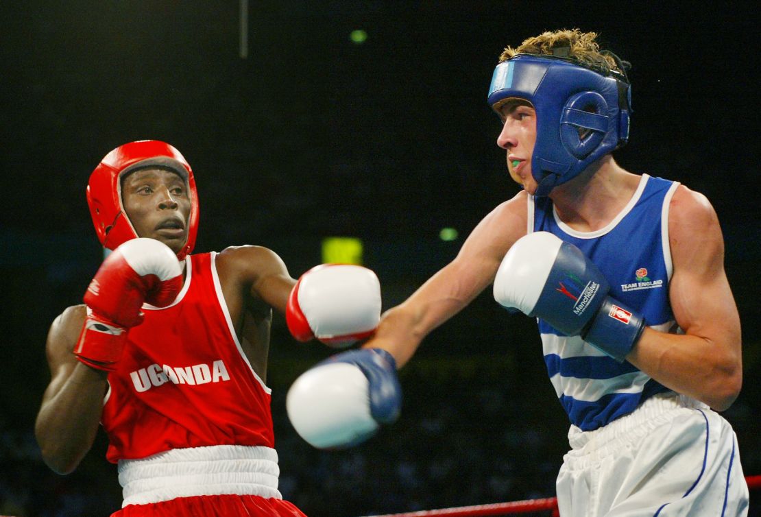 Kayongo (left) boxes England's Darren Barker in the 63.5kg final at the 2002 Commonwealth Games in Manchester.