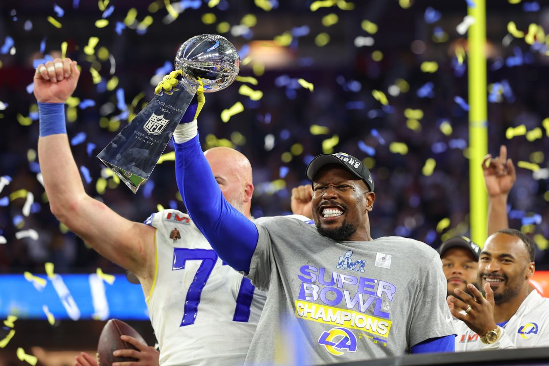 Miller holds up the Vince Lombardi Trophy after winning Super Bowl LVI.