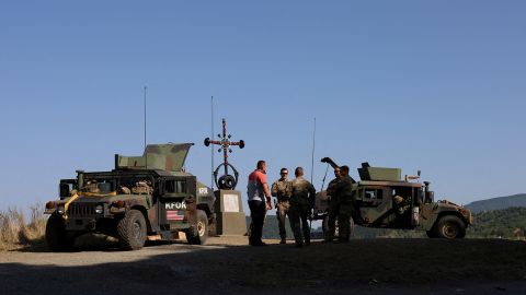 US troops take part in a KFOR patrol, near Jarinje border crossing in Kosovo on August 18, 2022. 