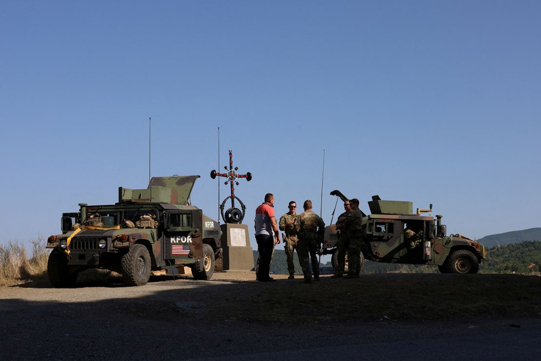 US troops take part in a KFOR patrol, near Jarinje border crossing in Kosovo on August 18, 2022.