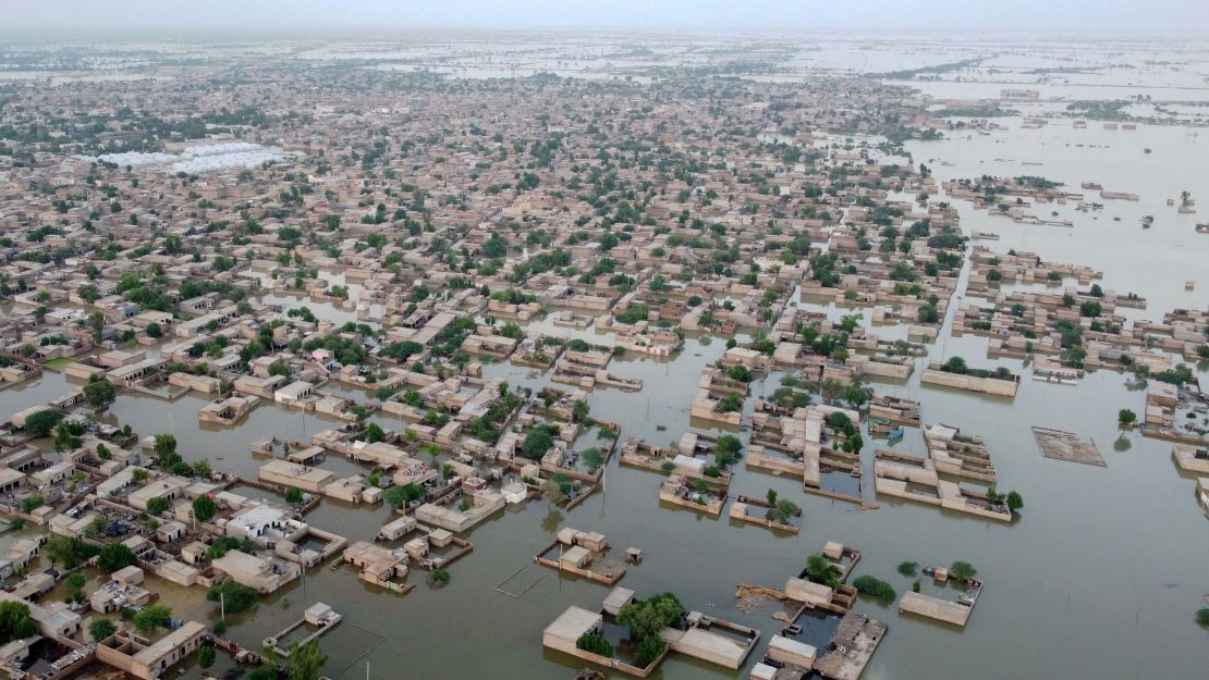 This aerial photograph, taken on September 1, 2022, shows flooded residential areas in the town of Dera Allah Yar town in Jaffarabad district, Balochistan province.