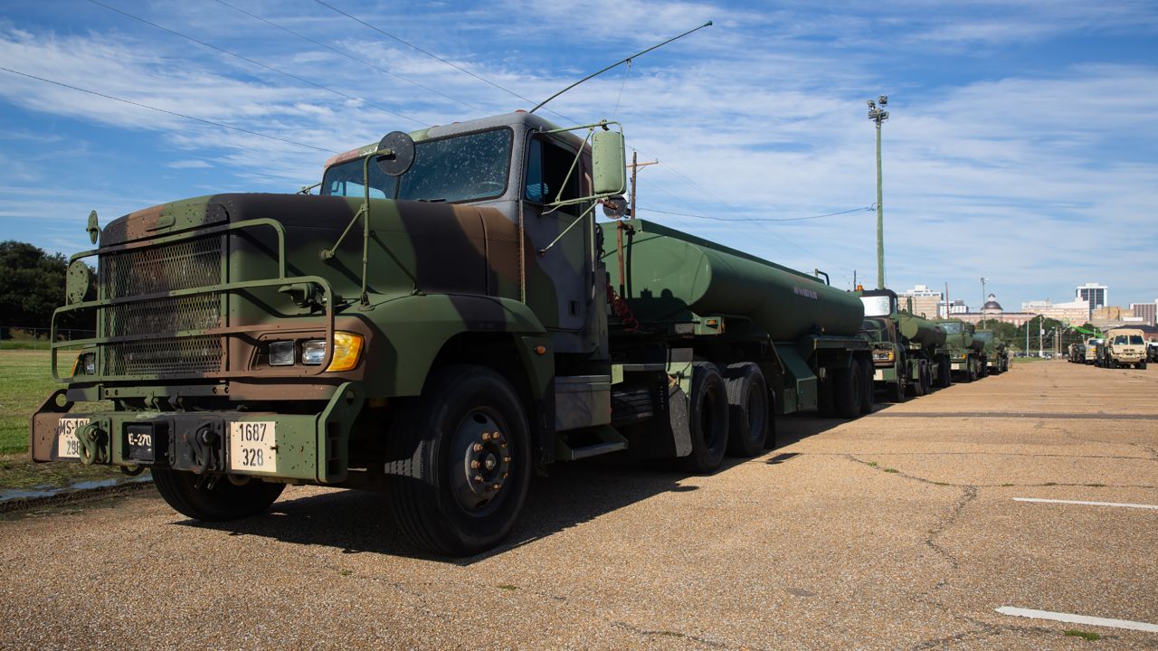 National Guard tankers full of nonpotable water are seen Thursday at the Mississippi State Fairgrounds in Jackson, Mississippi.