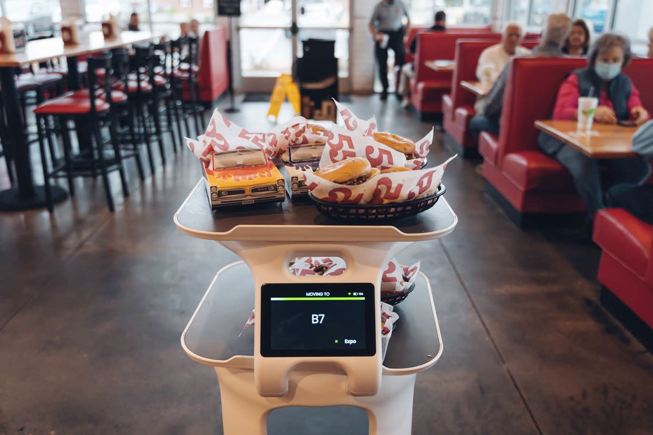 <strong>Robot runner:</strong> Robots aren't just serving diners in Asia. Servi by USA-based <a href="https://www.bearrobotics.ai" target="_blank" target="_blank">Bear Robotics</a> is helping fast food chains like Chilli's, Denny's and Highway 55 (pictured) offer slicker service amid staff shortages. By running orders from the kitchen to tables, it allows human staff to focus on more skilled tasks. The autonomous robots are also providing support in retirement homes and elderly care centers.
