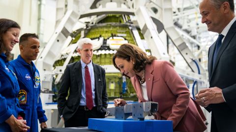 US Vice President Kamala Harris and her husband, Doug Emhoff, sign a piece of Artemis III hardware while touring the Kennedy Space Center in Florida on Monday, August 29.