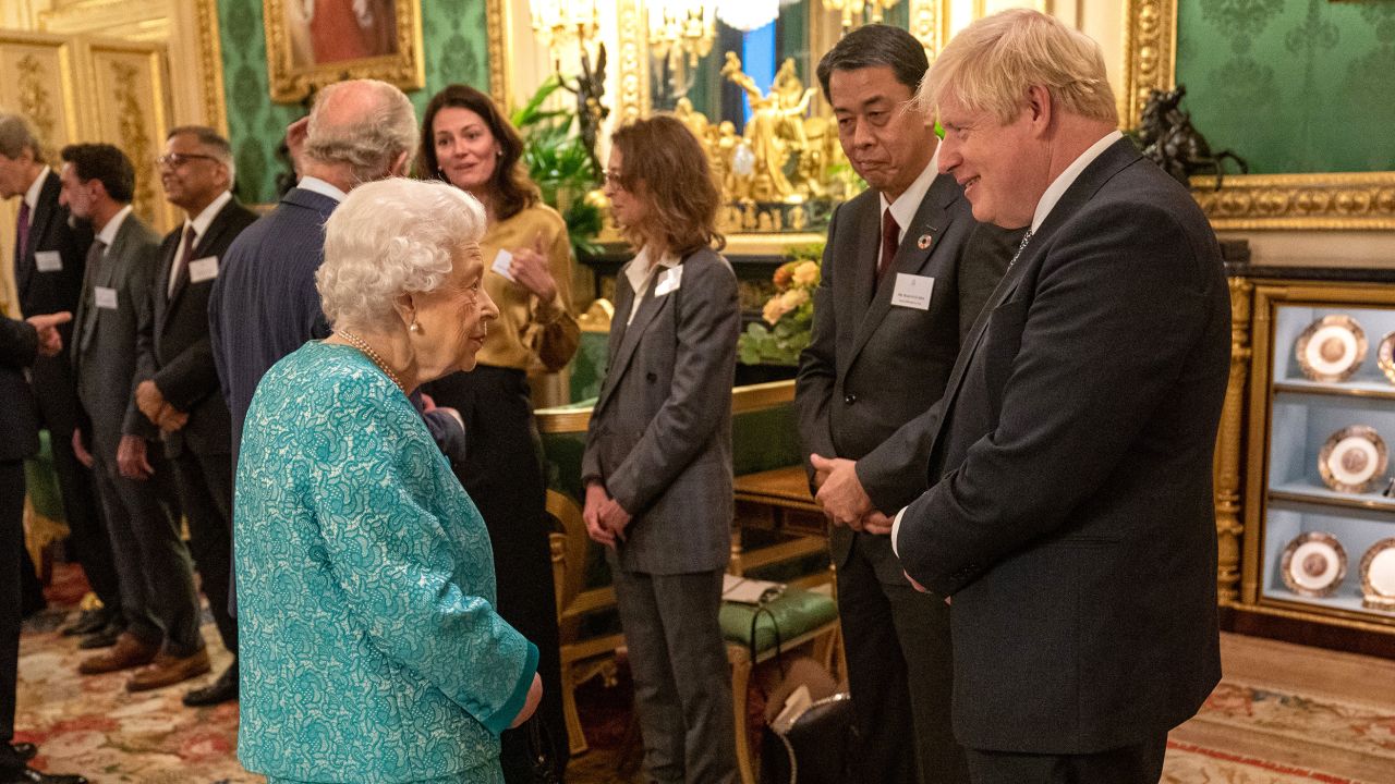 The Queen chats with Boris Johnson during a reception at Windsor Castle last October. 