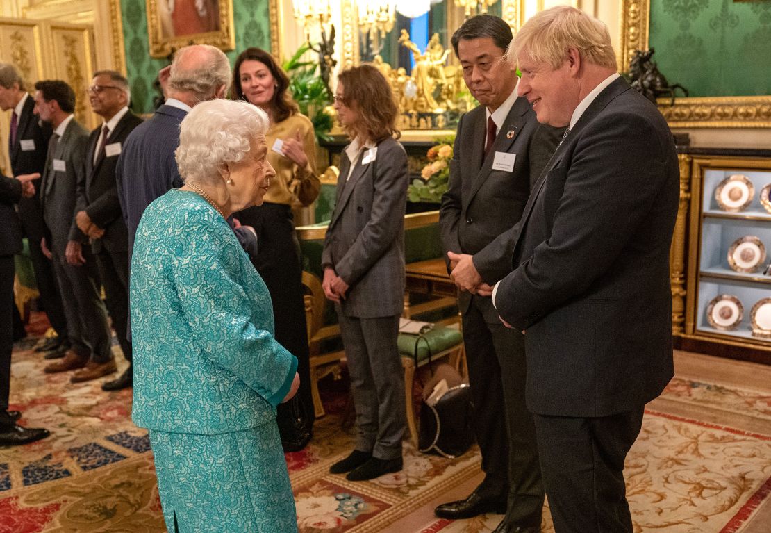 The Queen chats with Boris Johnson during a reception at Windsor Castle last October. 