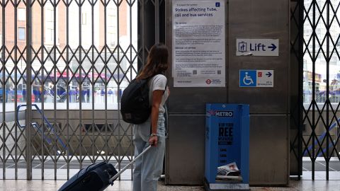 An information sheet is displayed outside Victoria Underground station in London on August 19, to advise the public on the planned strike.