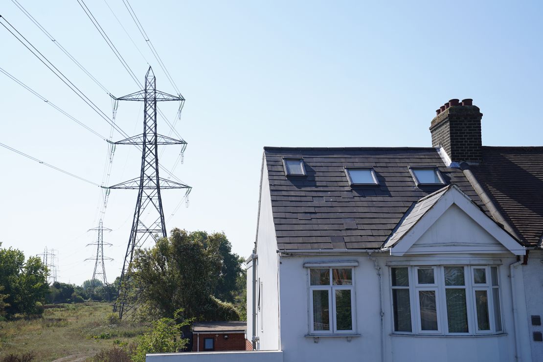 Electricity pylons in East London on Aug. 25. The country's regulator has confirmed energy bills could rise 80% in October.