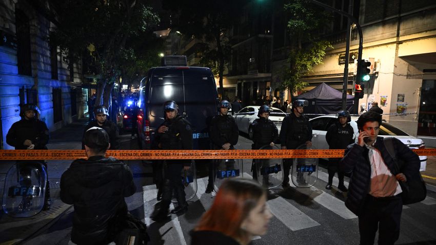 Police stand guard outside the residence of Argentine Vice-President Cristina Fernandez de Kirchner after a man pointed a gun at her in Buenos Aires on September 1, 2022. - A man was arrested Thursday in Argentina for pointing a gun at Vice-President Cristina Kirchner as she arrived at her home, said Security Minister Aníbal Fernández. (Photo by Luis ROBAYO / AFP) (Photo by LUIS ROBAYO/AFP via Getty Images)