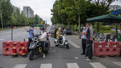 A police checkpoint during restrictions imposed in Chengdu, Sichuan province, because of an outbreak of Covid-19. 
