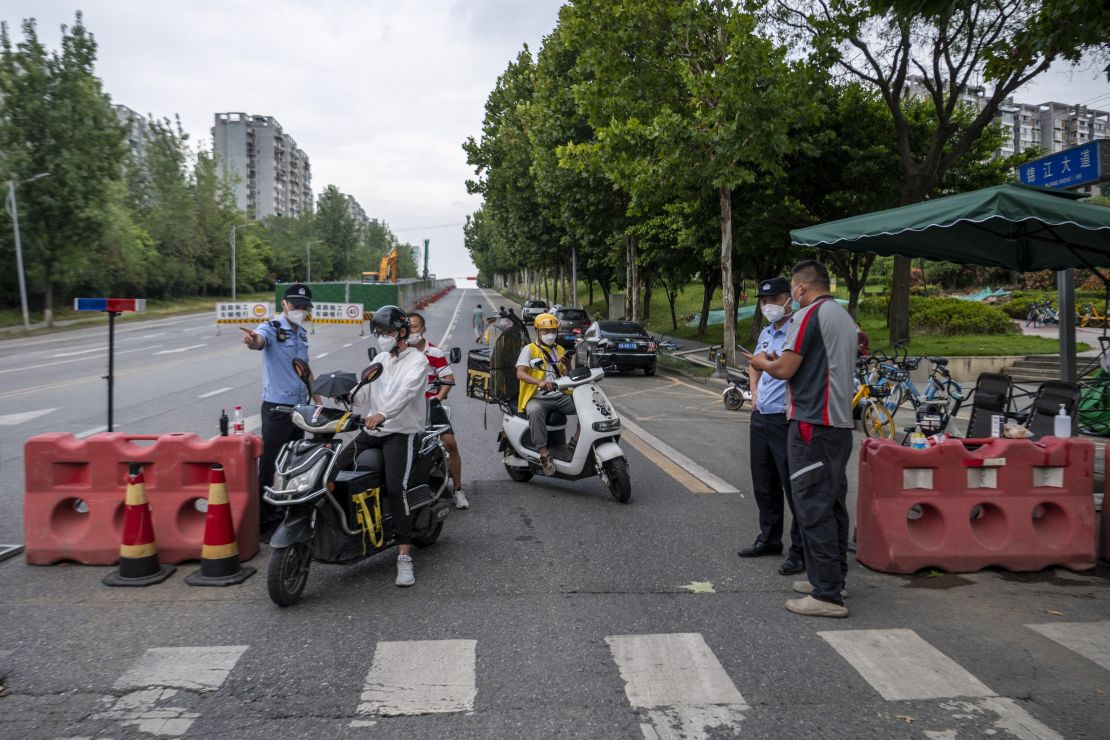 A police checkpoint during restrictions imposed in Chengdu, Sichuan province, because of an outbreak of Covid-19. 