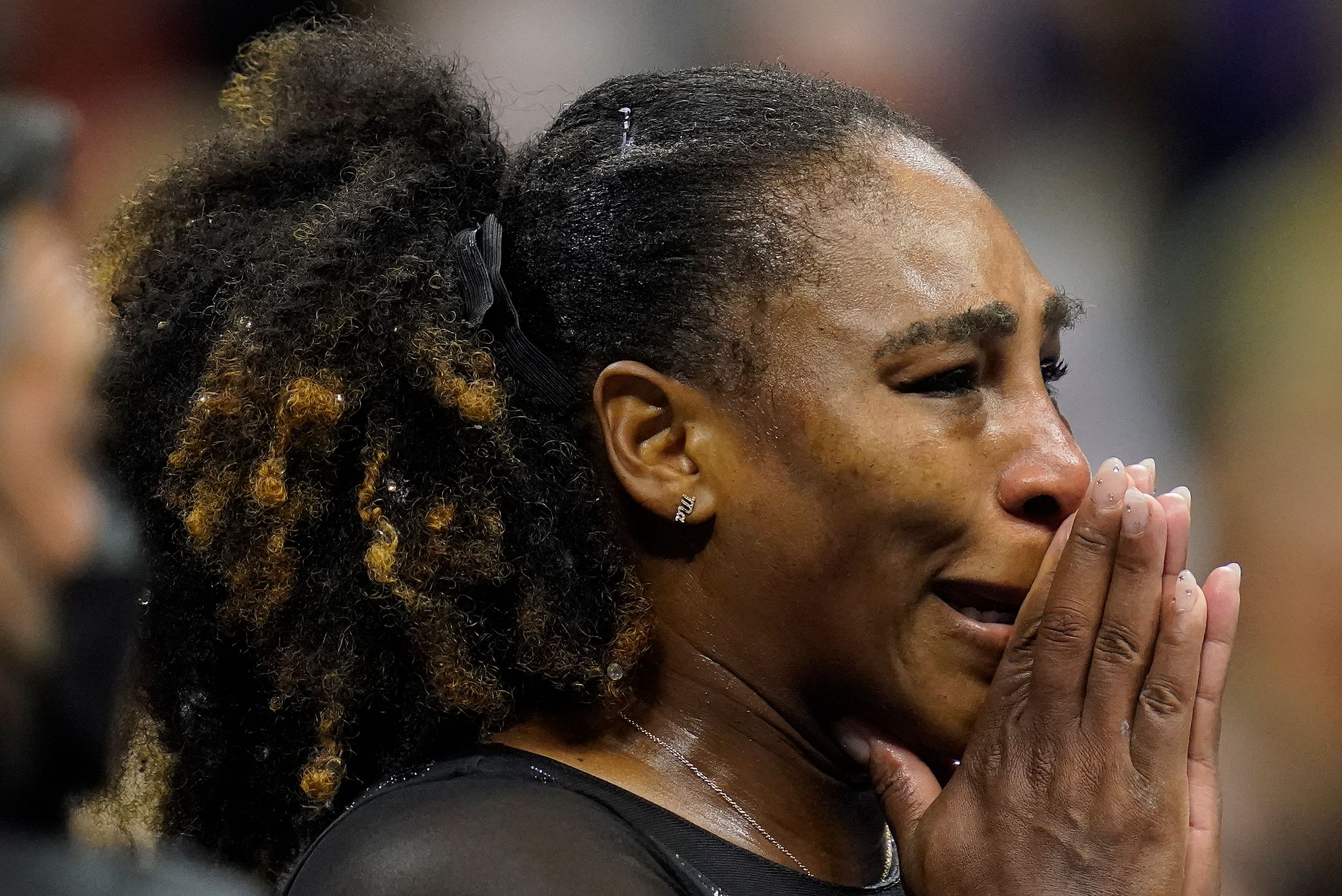 Williams reacts after losing to Ajla Tomljanović on Friday. 'These are happy tears,' Williams said during her on-court interview.