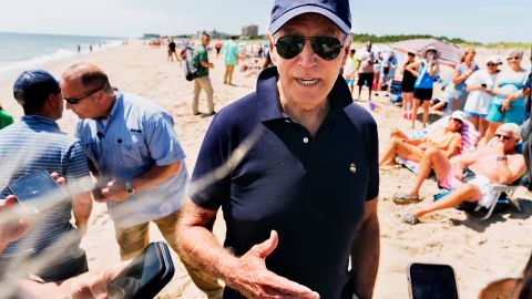President Joe Biden stops and speaks to members of the media in Rehoboth Beach, Delaware, on June 20, 2022. 
