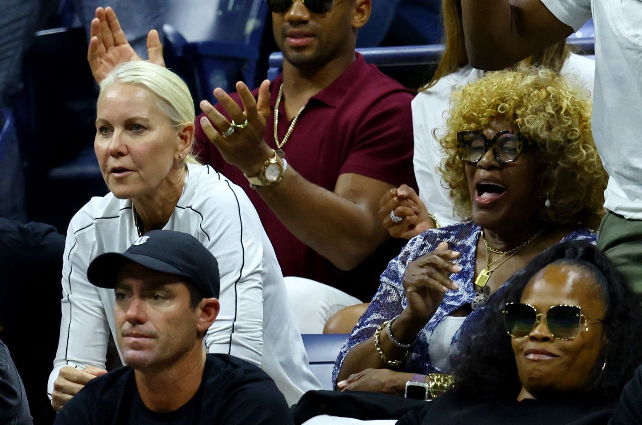 Williams' coach, Rennae Stubbs, and mother, Oracene Price, watch on Friday.