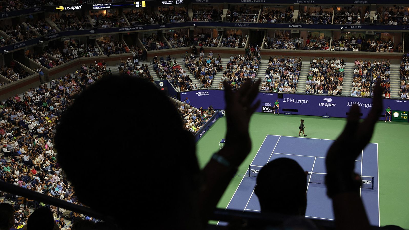 People cheer on Williams at Arthur Ashe Stadium.