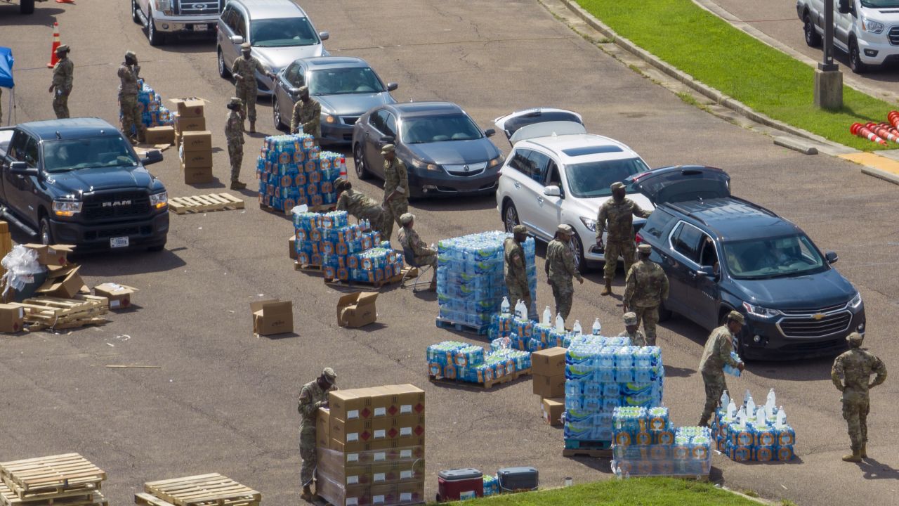 Members of the Mississippi National Guard distribute water and supplies to Jackson residents Friday in Jackson, Mississppi. 