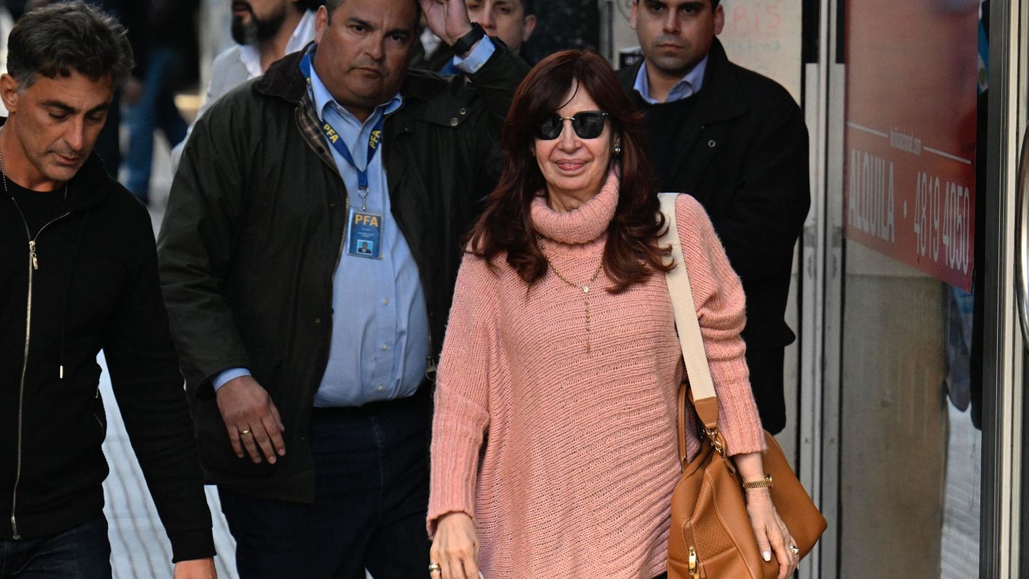 Argentine Vice President Cristina Fernandez de Kirchner walks to greet her supporters outside her home in Buenos Aires, on September 2, 2022. 