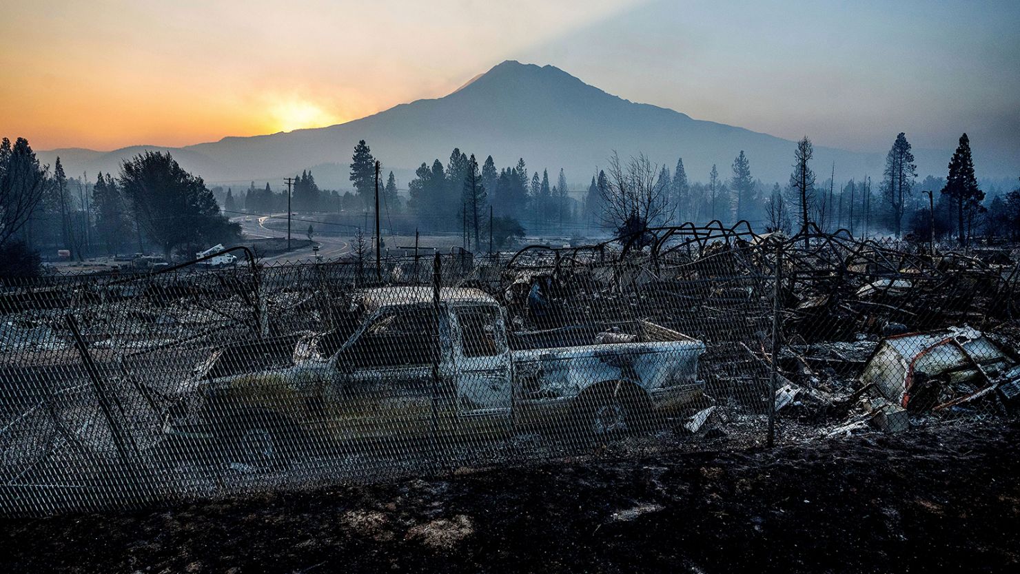 Saturday's sunrise over Mount Shasta revealed homes destroyed by the Mill Fire. 