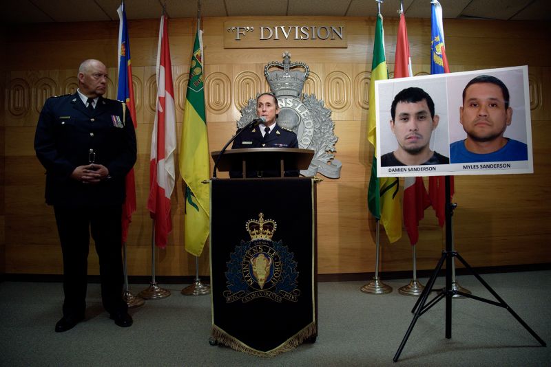 Canadian authorities charge 2 men with murder for a mass stabbing that killed 10 and injured 18. One of the suspects was found dead while the other is missing