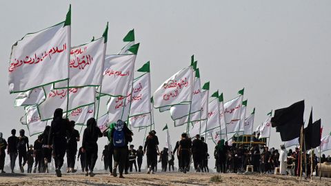 Iraq's Shia Muslim pilgrims march from the country's southern province of Jiqar to the holy city of Karbala on Saturday before the Albain religious festival. Each year, large numbers of pilgrims flock to the Iraqi holy cities of Najaf and Karbala to commemorate the murder of Imam Hussein, grandson of the Prophet Muhammad, in his 7th century AD, before Albain on the 40th day after Ashura. will gather. 