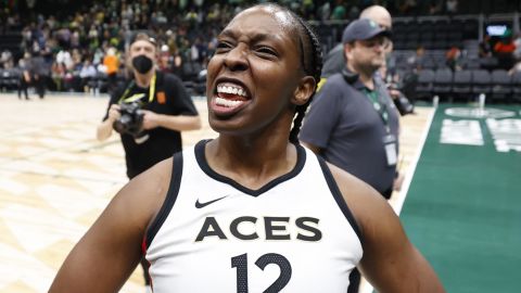 Chelsea Gray celebrates after the Las Vegas Aces beat the Seattle Storm in overtime.