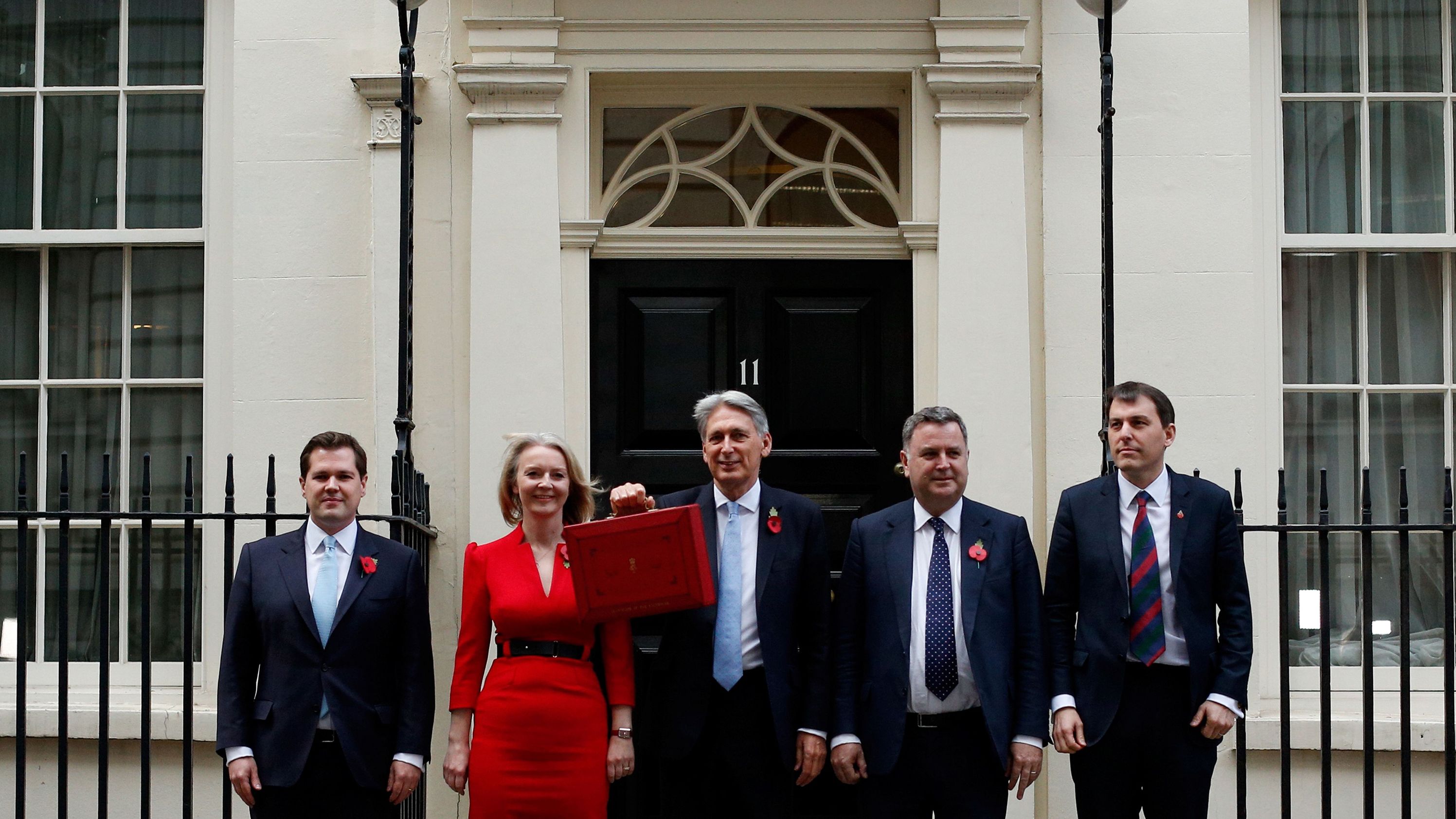 Truss, then as chief secretary to the Treasury, joins Chancellor of the Exchequer Philip Hammond and other members of the Treasury team before they presented the government's annual budget to Parliament in 2018.