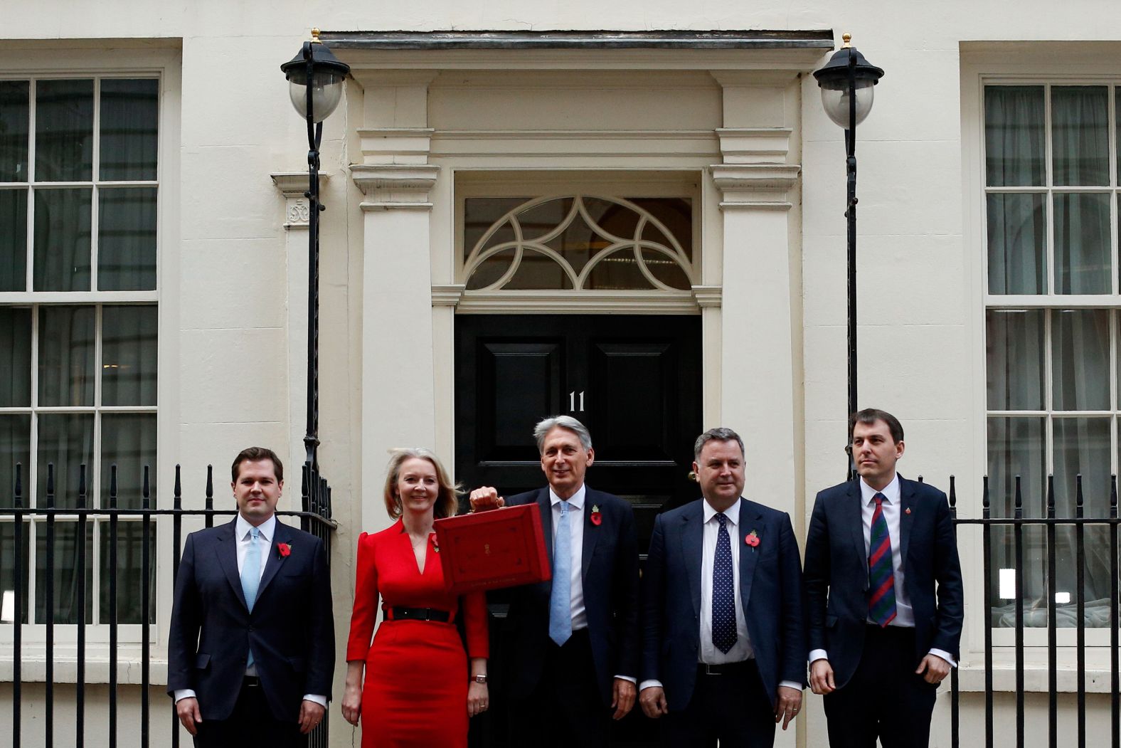Truss, then as chief secretary to the Treasury, joins Chancellor of the Exchequer Philip Hammond and other members of the Treasury team before they presented the government's annual budget to Parliament in 2018.