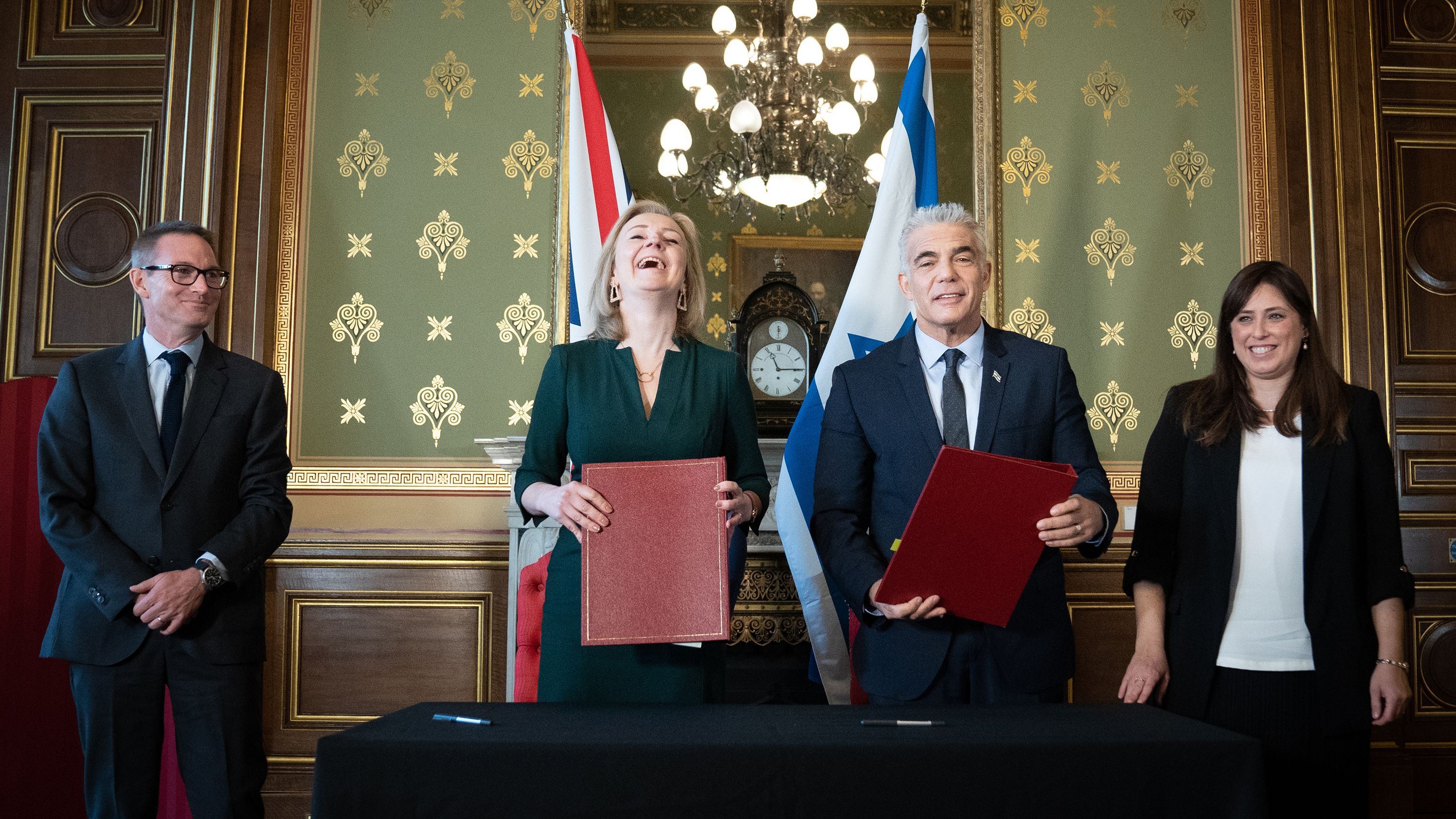 Truss, as foreign secretary, stands with Israeli Foreign Minister Yair Lapid as they met in London in November 2021.