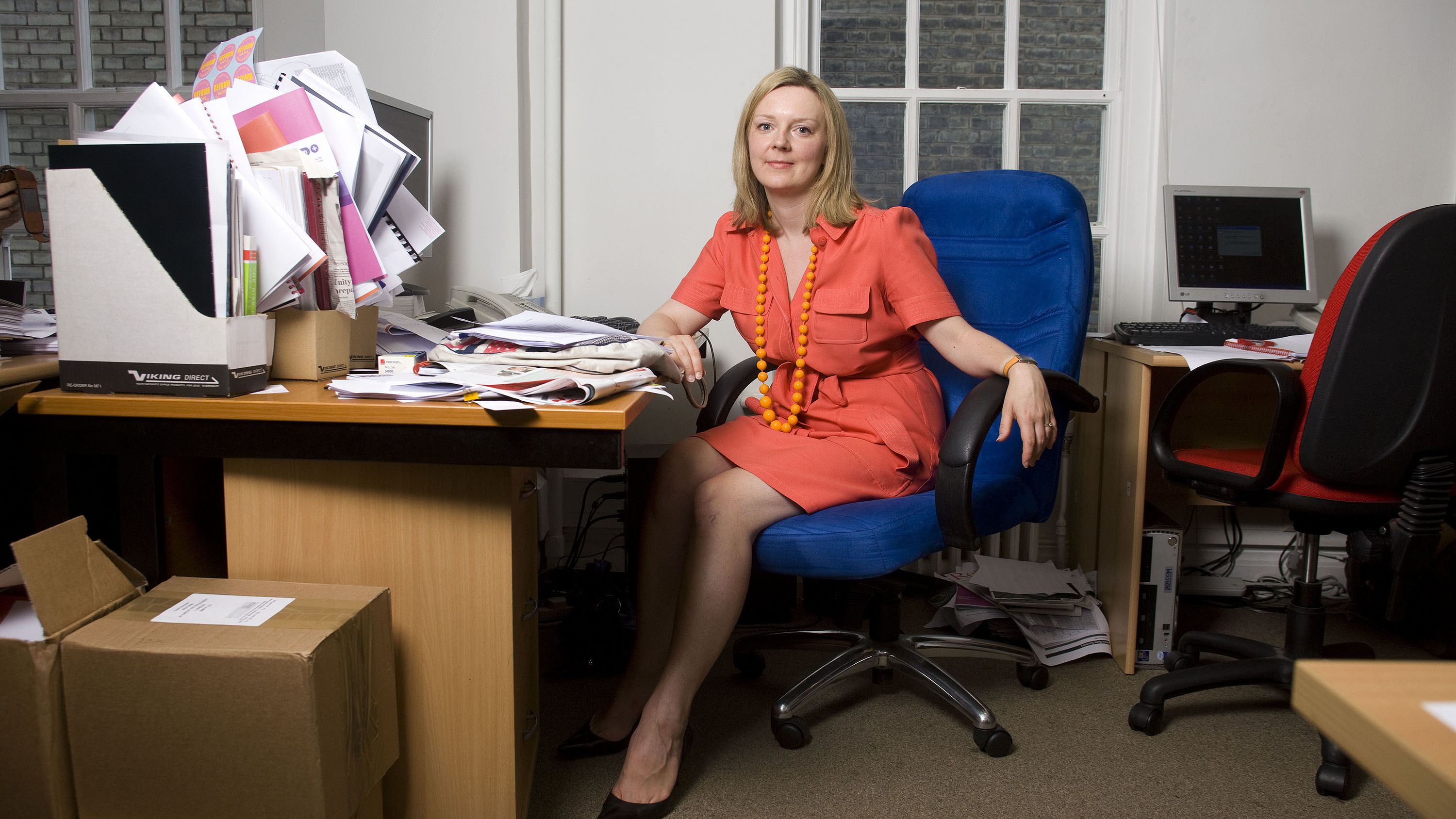 Truss is photographed in her London office while she was deputy director of Reform, a policy think tank, in 2009.