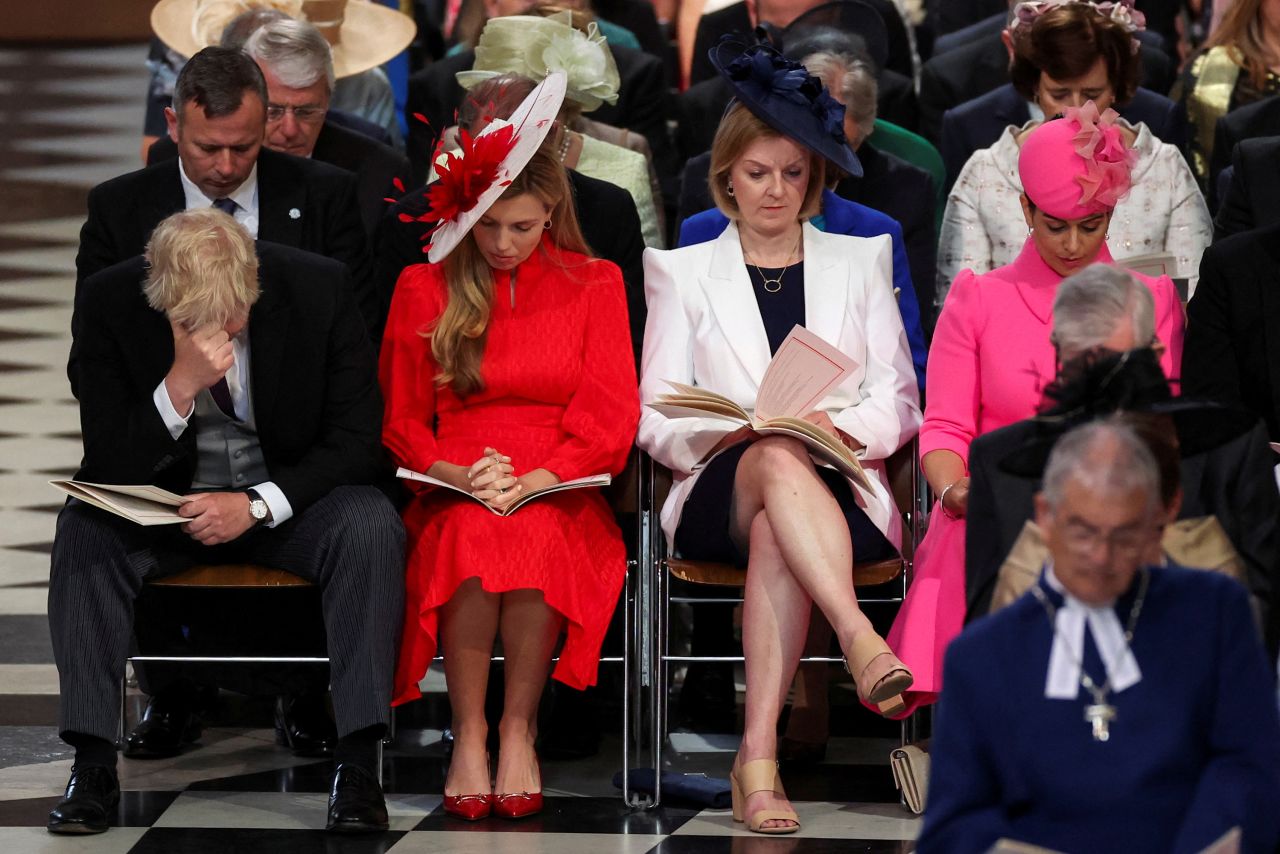 Truss and Home Secretary Priti Patel, right, sit with British Prime Minister Boris Johnson and his wife, Carrie, during the National Service of Thanksgiving in June 2022. It was part of celebrations marking the Queen's Platinum Jubilee.