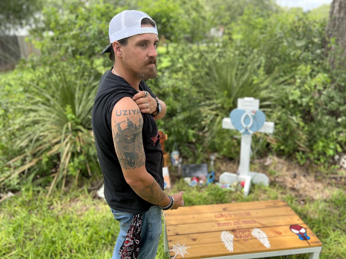 Brett Cross shows his tattoo honoring his slain nephew Uziyah Garcia, whom he was raising as his own son.