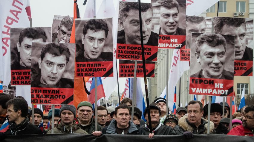 MOSCOW, RUSSIA - MARCH 01: People march during a march in memory of Russian opposition leader and former Deputy Prime Minister Boris Nemtsov on March 01, 2015 in central Moscow, Russia. Nemtsov was murdered on Bolshoi Moskvoretsky bridge near St. Basil cathedral just few steps from the Kremlin on February 27. Nemtsov, a fierce critic of President Vladimir Putin, was shot dead ahead of a major opposition rally this weekend. (Photo by Alexander Aksakov/Getty Images)