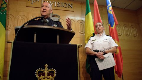 Regina Police Chief Evan Bray, left, speaks as Assistant Commissioner Rhonda Blackmore looks on during a press conference Monday.