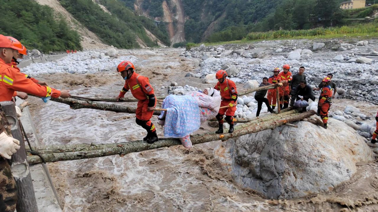 Rescuers transfer injured people in Luding county, Ganzi prefecture, Sichuan Province, China, Sept 5, 2022.