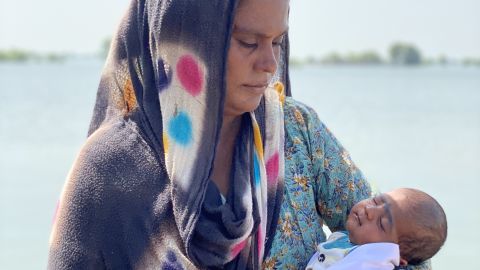Kainat Solangi and her 24-day-old infant, Shumaila, stranded by floodwater on September 5, 2022.