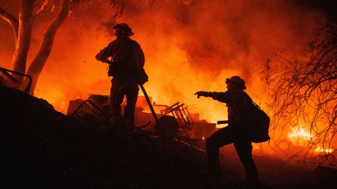 Firefighters battling the fast-moving Fairview Fire near Hemet, California, on Monday.