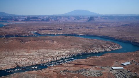 Boats are seen in low water at the Antelope Point Marina in Lake Powell on the Colorado River in Page, Arizona, on September 4, 2022. 