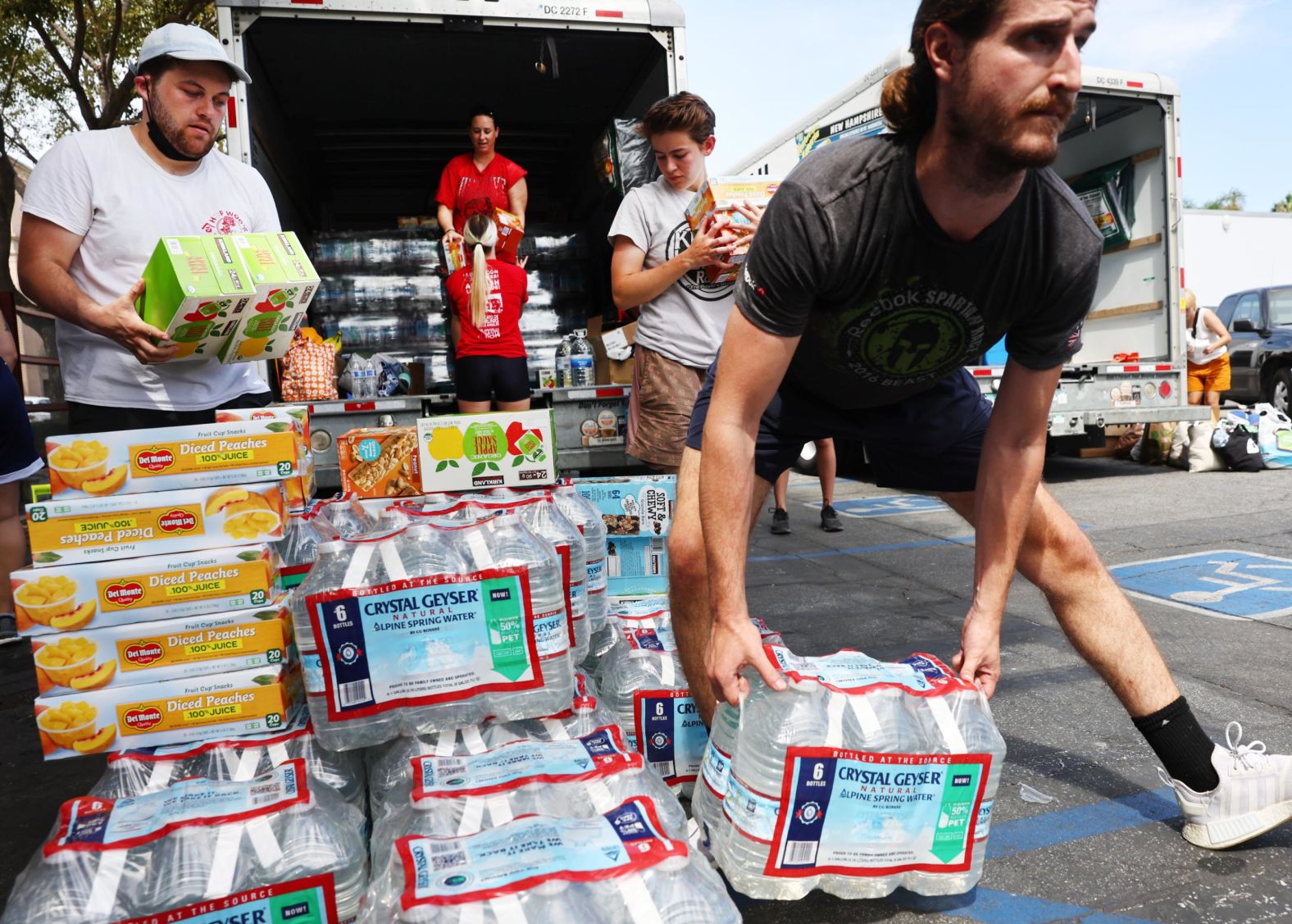 Volunteers with Water Drop LA prepare to deliver water and other items to members of the Skid Row community in Los Angeles on September 4.