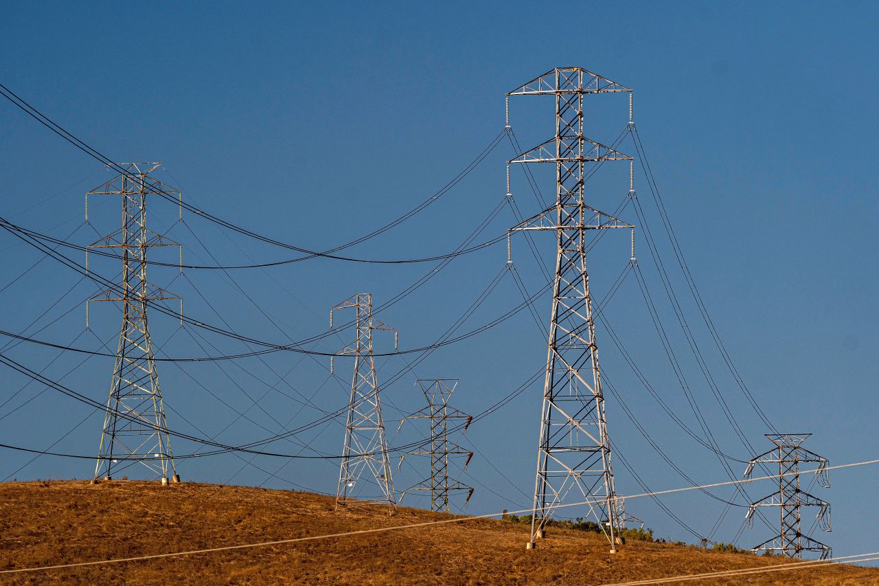 Electrical transmission towers are seen in Vallejo, California, on Sunday, September 4. Blisteringly hot temperatures and a rash of wildfires are posing a twin threat to California's power grid.