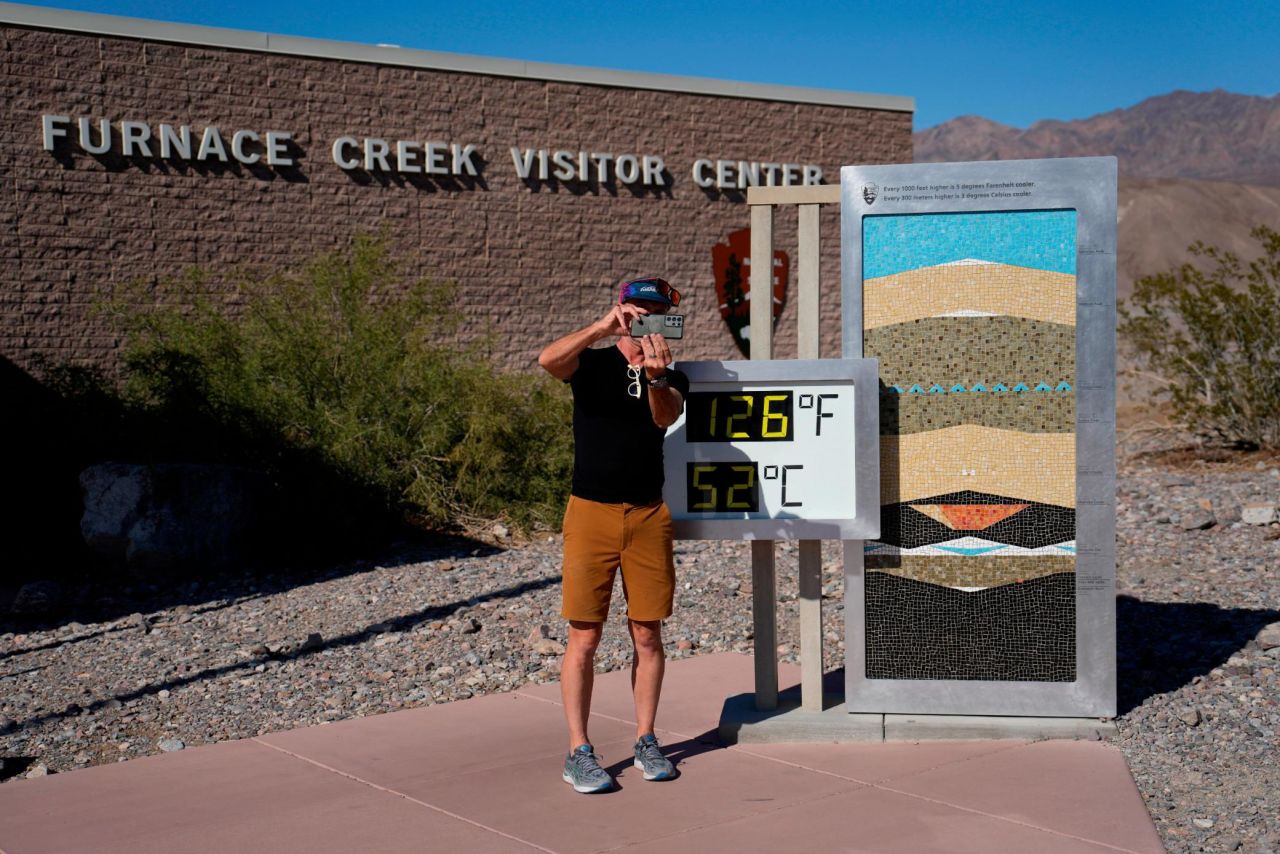 A man takes a selfie at a thermometer in California's Death Valley National Park on Thursday, September 1.