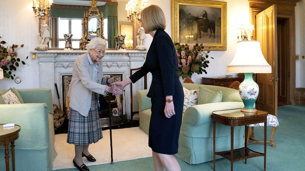 Queen Elizabeth II, left, welcomes Liz Truss during an audience at Balmoral, Scotland, where she invited the newly elected leader of the Conservative party to form a government on September 6.