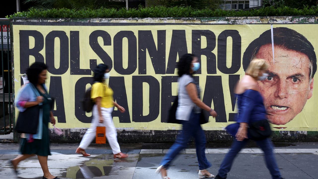 A poster of the Brazilian president's face with the phrase "Bolsonaro in jail" on Paulista Avenue in Sao Paulo.