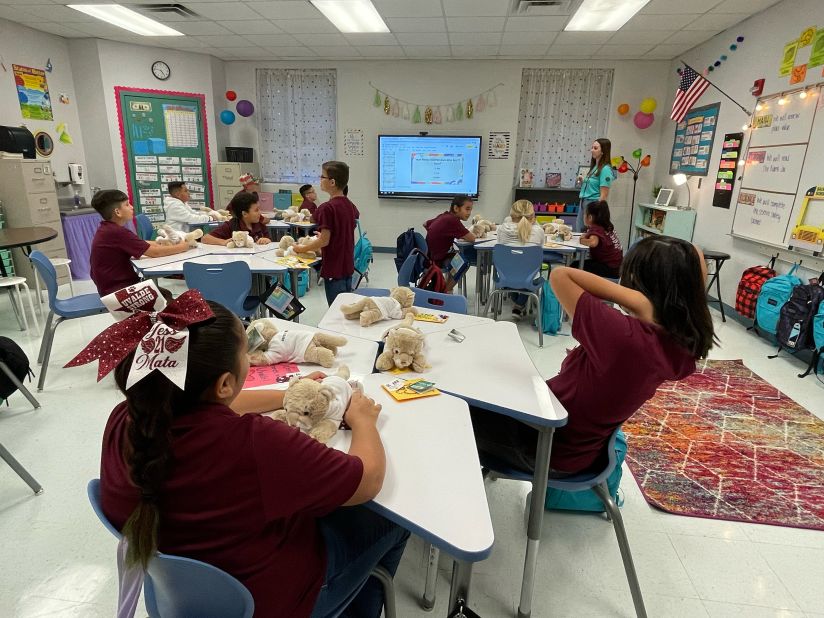 Students during class on their first day back. Stuffed animals with notes of encouragement <a href="https://www.cbsnews.com/dfw/news/ella-klimowicz-uvalde-stuffed-animals/" target="_blank" target="_blank">were organized by a survivor</a> of last year's <a href="https://www.cnn.com/2021/12/04/us/michigan-oxford-high-school-shooting-timeline/index.html" target="_blank">Oxford High School</a> shooting. 