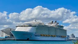 The cruise ship "The Harmony of the Seas" part of the Royal Caribbean International fleet, is seen moored at a quay in the port of Miami, Florida, on December 23, 2020.