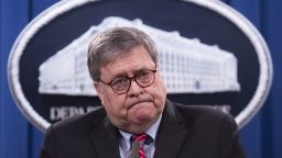 William Barr, U.S. attorney general, listens during a news conference at the U.S. Department of Justice in Washington, D.C., U.S., on Monday Dec. 21, 2020. Barr announced criminal charges against an alleged bombmaker in the 1988 terrorist bombing of Pan Am flight 103 over Lockerbie, Scotland, CNN reported. Photographer: Michael Reynolds/EPA/Bloomberg via Getty Images