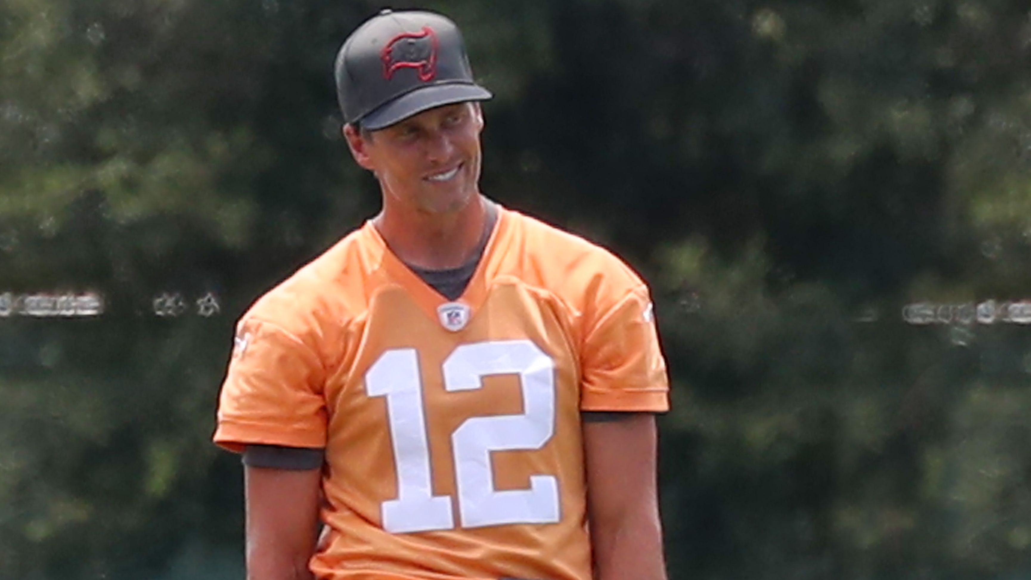 Brady smiles during a Bucs training camp session.